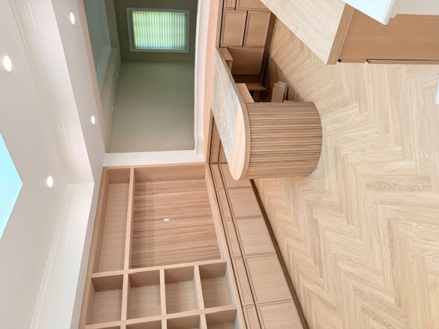 Home office after renovation: custom built-ins, herringbone floors and a skylight