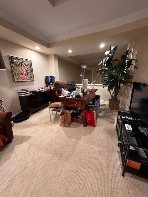 Home office before renovation: dated carpet and a cluttered layout