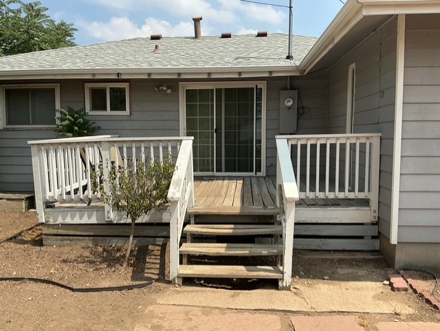 Old rotted deck with deteriorating railings